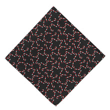 Load image into Gallery viewer, A black pocket square, folded into a diamond, with a candy cane designed scattered across it