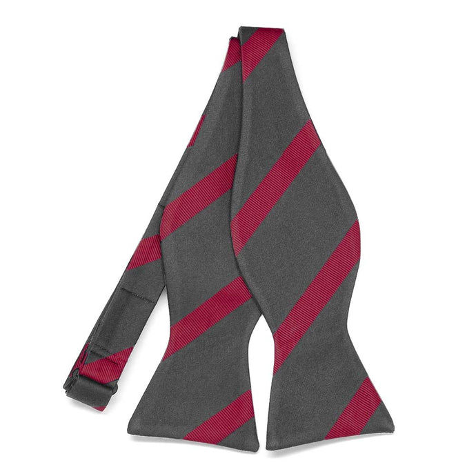 Untied dark gray and red striped self-tie bow tie