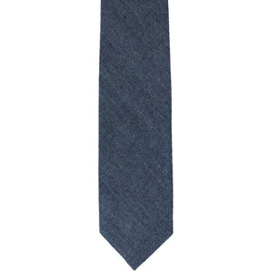 The front of a denim skinny tie, laid out flat