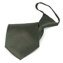 Load image into Gallery viewer, Folded front view of a dark green and sage green chevron pattern zipper style tie