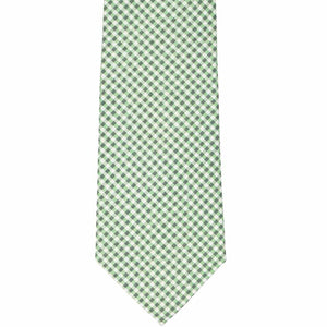 The front of an extra long tie with a small green, gray and white gingham pattern