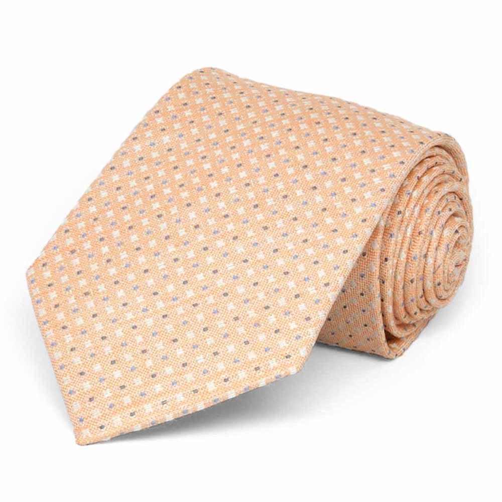 Light orange necktie, rolled to show tiny blue and white check details