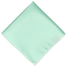 Load image into Gallery viewer, Solid light seafoam pocket square folded into a diamond