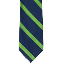 Load image into Gallery viewer, The front of a navy blue tie with bright green ribbed stripes