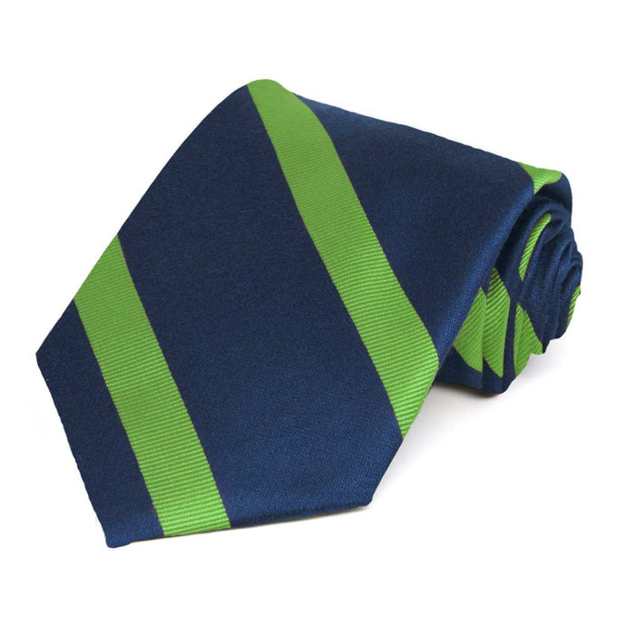 Navy blue and grass green striped extra long tie, rolled to show texture