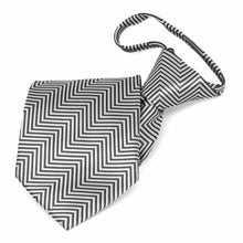 Load image into Gallery viewer, Folded view of a gray and white chevron pattern zipper style tie