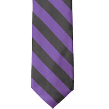 Load image into Gallery viewer, The front of a purple and gray striped tie, laid out flat