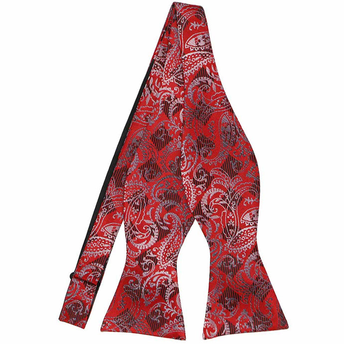 A red and light silver paisley checked self-tie bow tie, untied