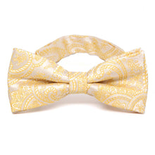 Load image into Gallery viewer, Light yellow paisley bow tie, close up front view to show pattern